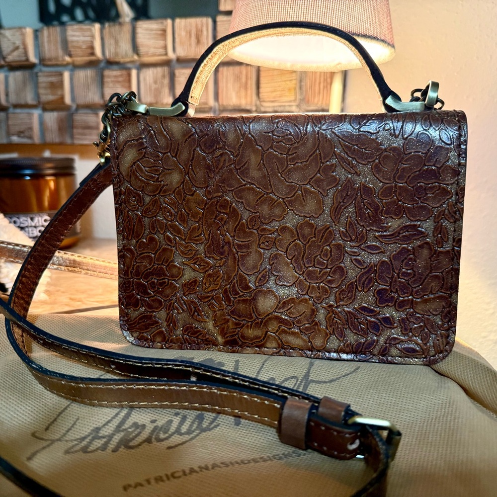 Elegant Brown Floral Embossed Handbag by Patricia Nash